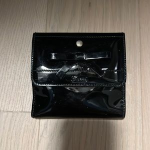 Women’s black patent leather Gucci wallet